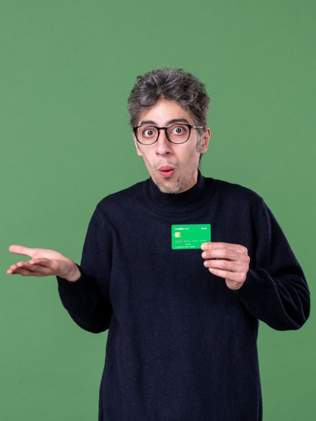 A man with credit card in his hand