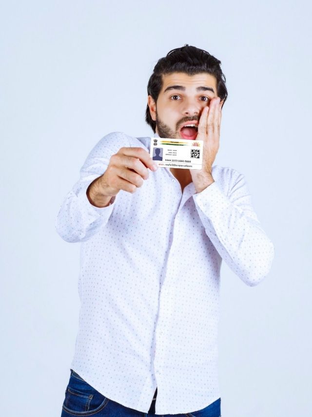 A man showing aadhar card with worried expressions